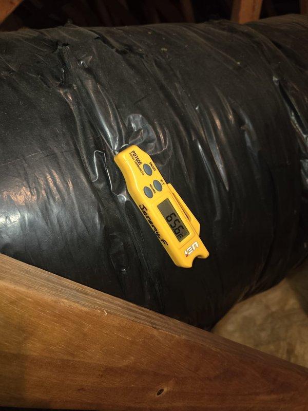 Performed routine maintenance on cooling system, including temperature and airflow diagnostics in attic space. Measured supply and return air temperatures using calibrated digital instruments, recording readings at flexible ductwork and insulated metal duct sections. System operating within normal parameters with no deficiencies noted.