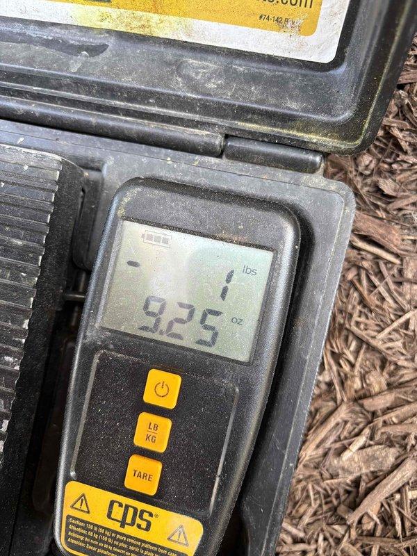 Responded to service call for fan coil unit leaking water onto attic floor on fourth level. Upon inspection, discovered condensate drain line issue with improper airflow causing water backup. Identified and marked blow hole location on PVC condensate piping to prevent future blockage. Verified condensate pump operation and measured refrigerant charge at 92.5 lbs to ensure system was operating within manufacturer specifications. Cleared condensate line obstruction, tested drain flow, and confirmed no further leaking from unit. System restored to normal operation with proper condensate drainage functioning correctly.