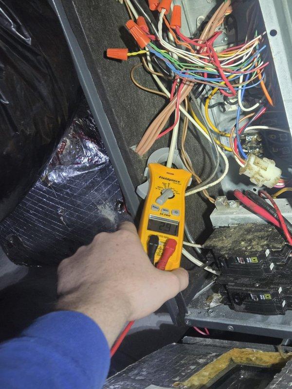 Completed routine cooling maintenance visit on HVAC system. Performed electrical diagnostics and testing on control panel circuits using digital multimeter to verify proper system operation. Measured supply air temperature at 55.1°F at ceiling diffuser, confirming adequate cooling performance. Noted filter sizes required are 24x24x1, 18x18x1, and 14x14x1; customer will provide their own filters for future maintenance.