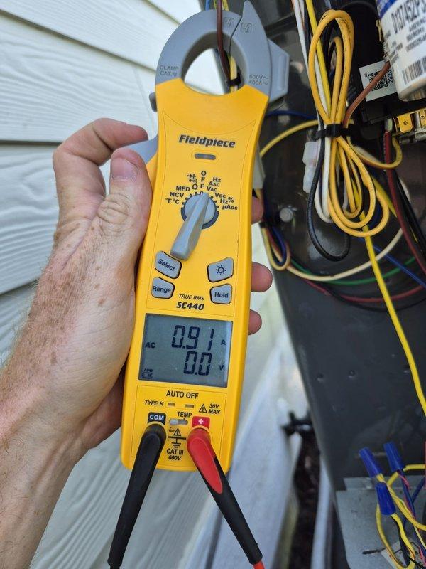 Completed routine cooling maintenance visit on two HVAC systems. Performed comprehensive diagnostics using clamp meter to verify electrical readings and system performance. Measured amperage draws and voltage levels at outdoor condensing units to ensure proper operation. Inspected electrical connections, capacitors, and wiring at both systems. All components tested within normal operating parameters. Systems operating efficiently with no issues found. Documentation photos captured of diagnostic readings during service.