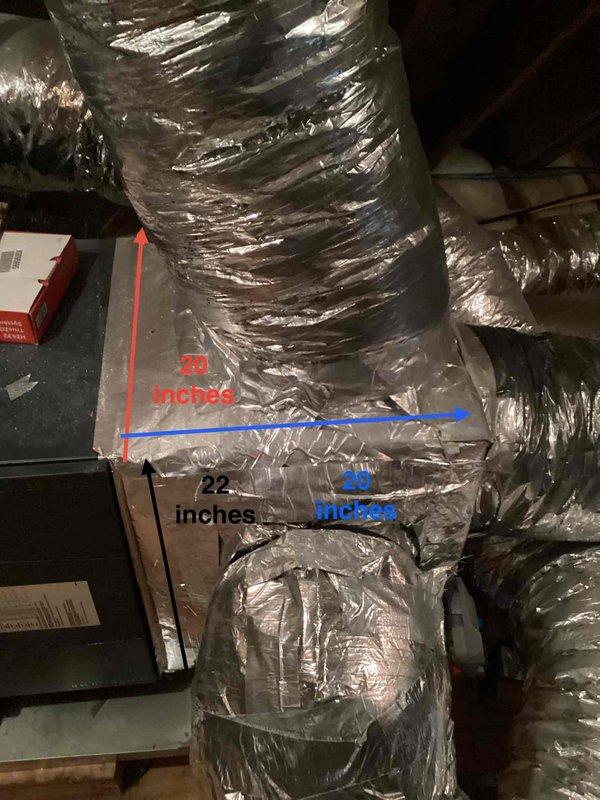 Responded to service call for outdoor unit making excessive noise and failure to heat. Upon inspection, diagnosed mechanical failure in outdoor unit compressor assembly. Documented existing ductwork configuration showing 22-inch and 30-inch flexible metallic ducts in attic space with multiple zone connections to air handling equipment. Verified control system wiring and thermostat connections at zone control panel mounted on ceiling joists, confirming proper electrical connections and communication between components. Restored heating operation to affected zone and verified system performance before departure.