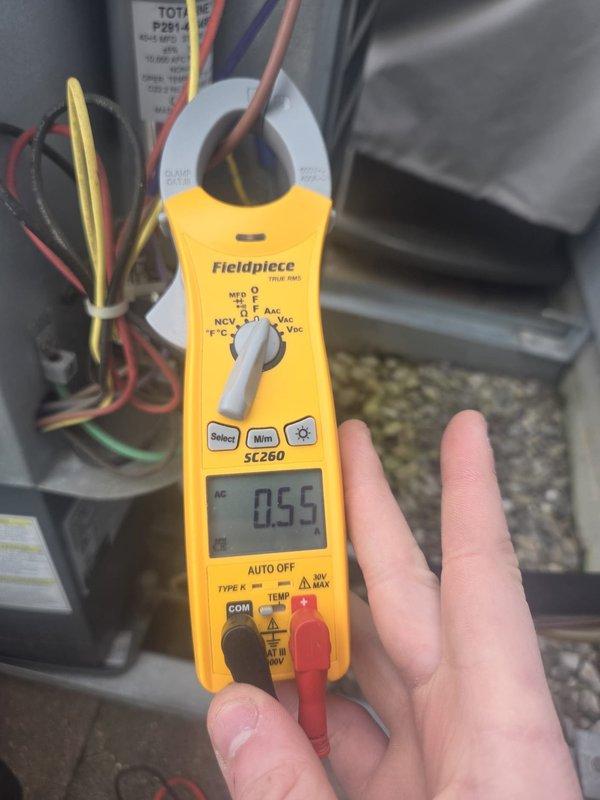 Performed comprehensive cooling system maintenance and diagnostics on residential HVAC unit. Utilized Fieldpiece SC260 clamp meter to measure electrical current draw on system wiring, recording 55-amp reading, and verified proper amperage across multiple circuits. Inspected capacitor condition and all electrical connections within outdoor condensing unit. Measured and documented ambient temperature at 76°F using calibrated digital thermometer. All electrical components, wiring connections, and system operations tested and confirmed within normal parameters for continued reliable cooling performance.