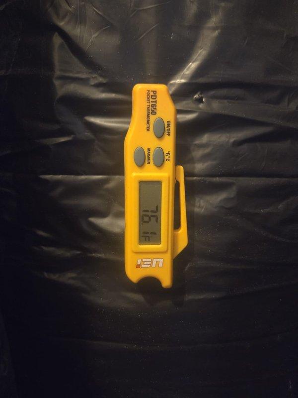 Performed comprehensive cooling system maintenance and diagnostics on residential HVAC unit. Utilized Fieldpiece SC260 clamp meter to measure electrical current draw on system wiring, recording 55-amp reading, and verified proper amperage across multiple circuits. Inspected capacitor condition and all electrical connections within outdoor condensing unit. Measured and documented ambient temperature at 76°F using calibrated digital thermometer. All electrical components, wiring connections, and system operations tested and confirmed within normal parameters for continued reliable cooling performance.