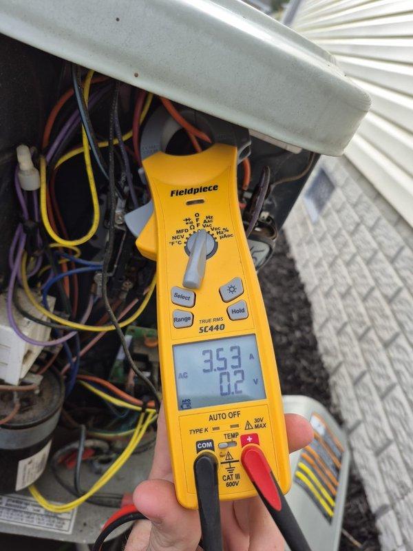 Completed cooling maintenance visit on two HVAC systems. Performed electrical diagnostics using digital multimeter, recording voltage readings of 36.9V and 24.8V at various terminal points within the units. Discussed thermostat upgrade options with customer and recommended obtaining replacement estimate proactively before peak cooling season to avoid emergency situations.