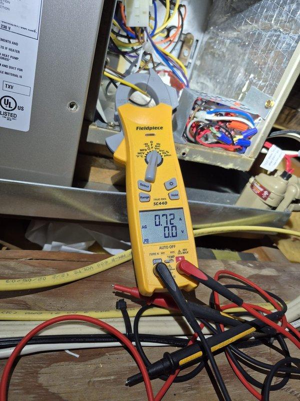 Performed routine cooling maintenance inspection on residential HVAC system. Utilized clamp meter to verify electrical parameters and amperage draw at the air handler, confirming proper system operation. Verified attic access stairs were secured per homeowner requirements to maintain proper conditioned space integrity.