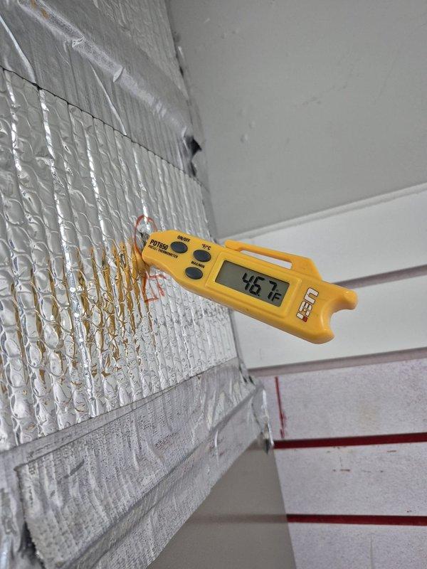 Completed scheduled cooling maintenance visit at commercial office location. Performed system diagnostics including temperature differential measurements at supply register, recording 46°F at insulated wall surface and 61.6°F at floor-level ventilation grate, confirming proper air distribution and cooling performance. All HVAC components inspected and system operating within normal parameters.