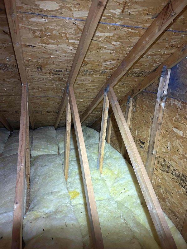 Completed routine cooling maintenance visit for two HVAC systems. Performed standard preventive maintenance procedures including inspection of attic-mounted equipment, verification of proper insulation clearances around ductwork and equipment, and assessment of installation conditions in unconditioned space. Both systems operational upon completion of maintenance tasks.
