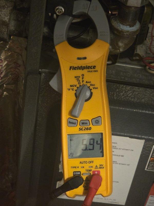 Performed routine cooling maintenance on HVAC system. Using calibrated clamp meter, verified compressor amperage draw and capacitor microfarad readings, confirming all electrical components operating within manufacturer specifications. System tested and left in proper working condition.