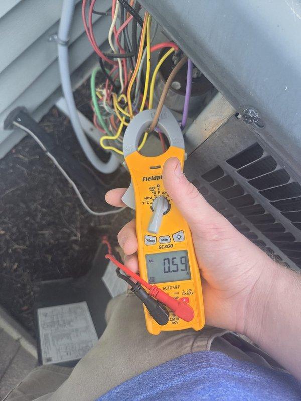 Performed routine cooling maintenance on HVAC system. Using calibrated clamp meter, verified compressor amperage draw and capacitor microfarad readings, confirming all electrical components operating within manufacturer specifications. System tested and left in proper working condition.