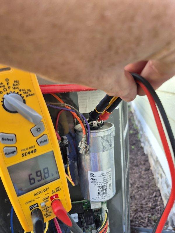 Performed semi-annual HVAC maintenance on cooling system, including electrical diagnostics with capacitor testing showing proper readings and refrigerant line inspection. Adjusted manual zone dampers to optimize seasonal airflow distribution throughout the zoned system, ensuring balanced comfort and efficient operation for the cooling season.