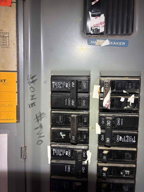 Completed cooling system inspection and tune-up as part of annual maintenance contract. Documented existing water heater with significant rust corrosion around top pipe connections and fittings, indicating potential age-related deterioration. Inspected electrical panel and verified all circuit breakers operational with proper labeling in place.