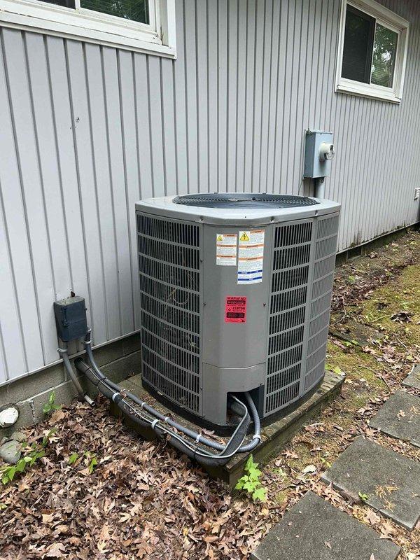 Completed routine cooling maintenance visit on two HVAC systems. Inspected outdoor condenser unit, verified refrigerant lines and electrical connections, and confirmed thermostat operation showing proper temperature control at 80-degree setpoint. All systems operating within normal parameters with no issues identified.