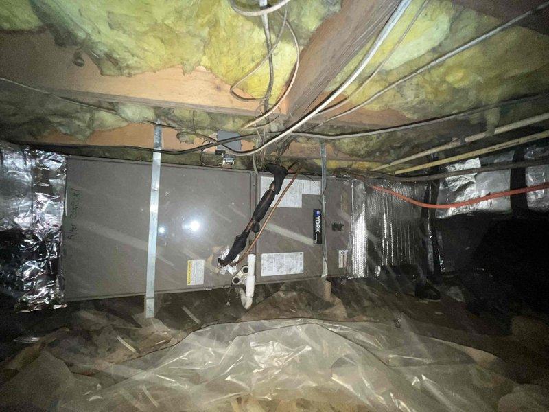 Performed leak search on HVAC system and determined suspected refrigerant loss was likely originating from Schrader core valves rather than system components. Replaced core valves and pressurized system to 367 psig for leak verification testing. Follow-up visit scheduled to confirm pressure holding and complete system startup if no pressure drop detected.
