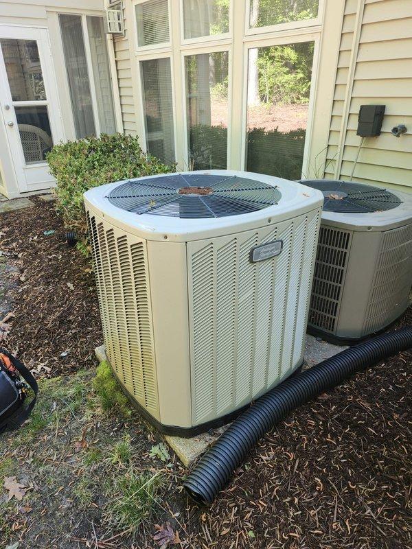 Completed scheduled cooling maintenance visit on two residential air conditioning systems. Performed comprehensive inspection of both outdoor condensing units, verified proper operation of compressors and condenser fans, checked refrigerant levels, and confirmed adequate airflow through coils. Cleared debris from around units and ensured proper drainage function. Both systems operating within normal parameters with no issues identified.
