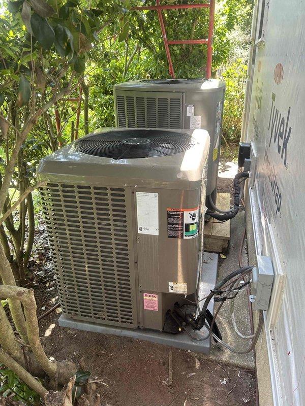 Responded to no heat call on residential heat pump system. Performed comprehensive leak search on refrigerant system and monitored system pressures, which remained stable throughout testing period. Determined refrigerant loss was likely occurring at Schrader core valves rather than system piping or components. Replaced core valves on service ports and pressurized system to 367 psig with nitrogen for pressure decay test. System left under pressure to confirm core valves were source of refrigerant loss. Follow-up visit required to verify pressures have held, complete evacuation, recharge system with proper refrigerant, and restore heating operation.