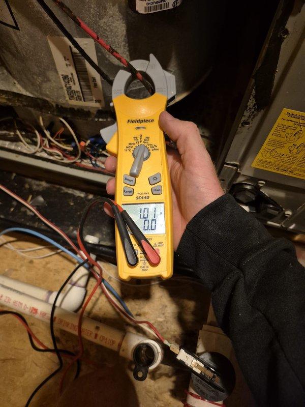 Completed routine cooling system maintenance inspection as second check under maintenance contract. Performed electrical diagnostics using clamp meter on both indoor and outdoor units, measuring voltage and amperage at multiple test points to verify proper system operation. All electrical components tested within normal operating parameters, and system found to be functioning correctly with no issues identified or repairs required.