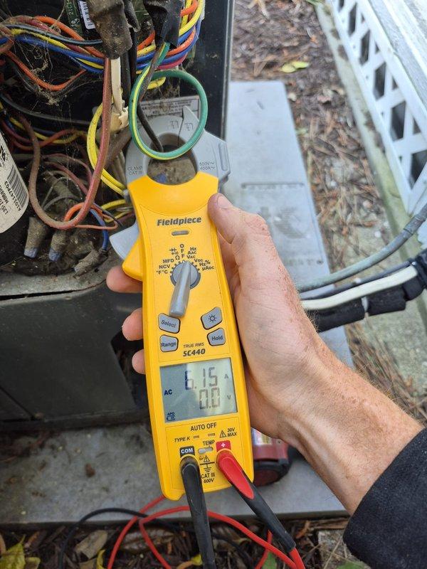 Completed routine cooling system maintenance inspection as second check under maintenance contract. Performed electrical diagnostics using clamp meter on both indoor and outdoor units, measuring voltage and amperage at multiple test points to verify proper system operation. All electrical components tested within normal operating parameters, and system found to be functioning correctly with no issues identified or repairs required.