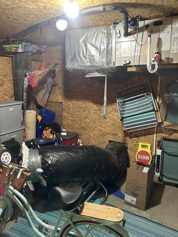 Responded to call for water leak at HVAC system in attic space. Upon inspection, identified loose piping connection at air handler unit causing water discharge. Tightened and secured all piping connections, verified proper drainage flow through condensate line, and confirmed system operation with no further leakage detected.