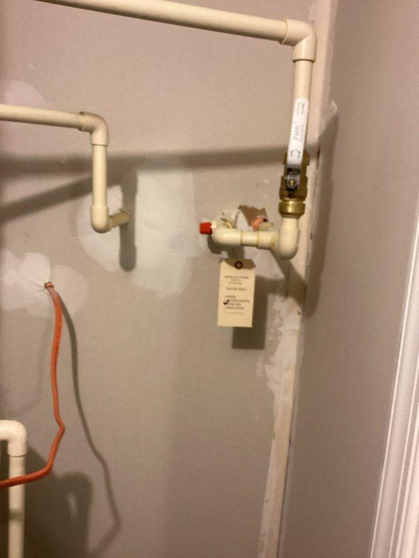 Installed Cash Acme mixing valve on water heater piping system. Part was previously ordered and picked up from warehouse counter. Installation completed in approximately 90 minutes, including integration with existing white PVC supply lines and brass fittings mounted above the water heater unit.
