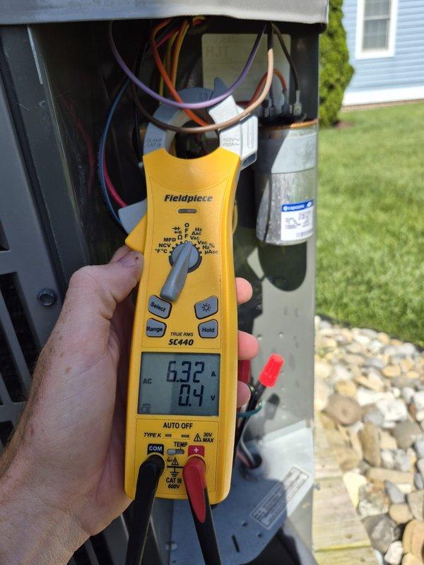 Completed scheduled cooling maintenance visit on residential HVAC system. Performed comprehensive system inspection including electrical testing of outdoor unit components using digital multimeter, verifying capacitor operation and electrical connections. Confirmed thermostat functionality showing system set to 69°F in off mode with fan set to auto. All components operating within normal parameters with no deficiencies noted.