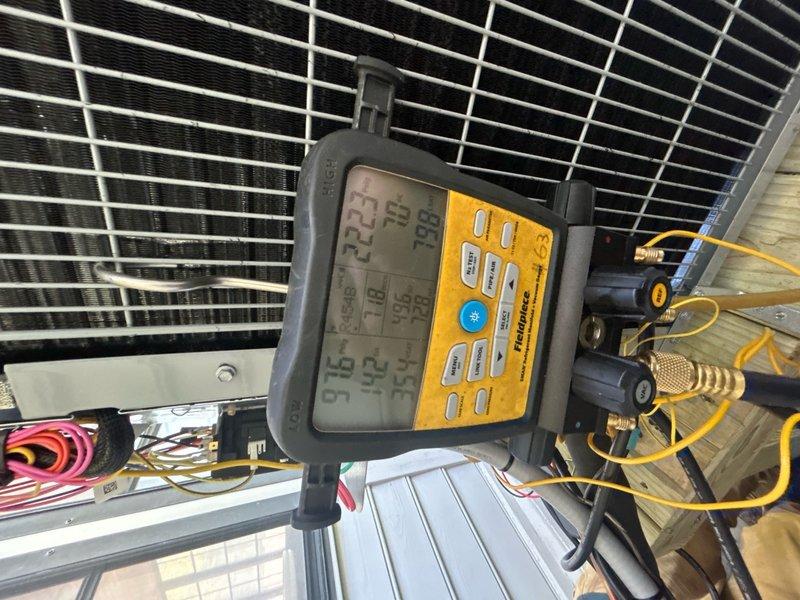 Completed full HVAC system replacement including removal and disposal of existing equipment. Installed Carrier 27SCA524A003 2-ton 15 SEER heat pump outdoor unit on treated wooden stand positioned over existing platform, Carrier FT5ANXB24L00 variable speed air handler, Carrier FF2601C10 10kW electric heat kit, and Honeywell WiFi thermostat. Fabricated and installed metal duct transitions to adapt new equipment to existing ductwork. Replaced outdoor electrical disconnect and electrical whip with new components. Reused existing electrical service, condensate drain lines, and power connections where applicable. Performed system startup, refrigerant charge verification, and operational testing using diagnostic equipment to confirm proper system performance across all operating modes. All equipment installed per manufacturer specifications and local code requirements. System operational and one-year maintenance agreement initiated for two-system residence.