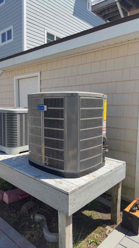 Completed full HVAC system replacement on upper floor, removing existing equipment and installing new 2-ton 14 SEER heat pump system including 5A6H4024 outdoor unit mounted on existing stand and 5TEM6B02 variable speed fan coil unit in drain pan with shutoff valve. Installed 10KW electric heater with breaker, 1-inch filter rack, electrical whip and disconnect, and flushed, pressure tested, and recharged refrigeration lines to manufacturer specifications. Programmed and configured new THX1200W WiFi thermostat for optimal system operation, providing complete climate control solution with one-year comprehensive warranty coverage on all installed equipment.