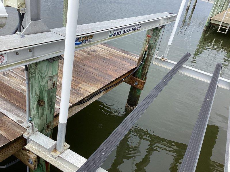 Completely repiped freeze-damaged dock water service line using 50 feet of 3/4" black poly tubing, brass male adapters, couplings, nipple, drop ear elbow, and boiler drain. Replaced corroded gas fittings and installed 15-foot gas quick disconnect line with new fittings for upper deck gas connection.