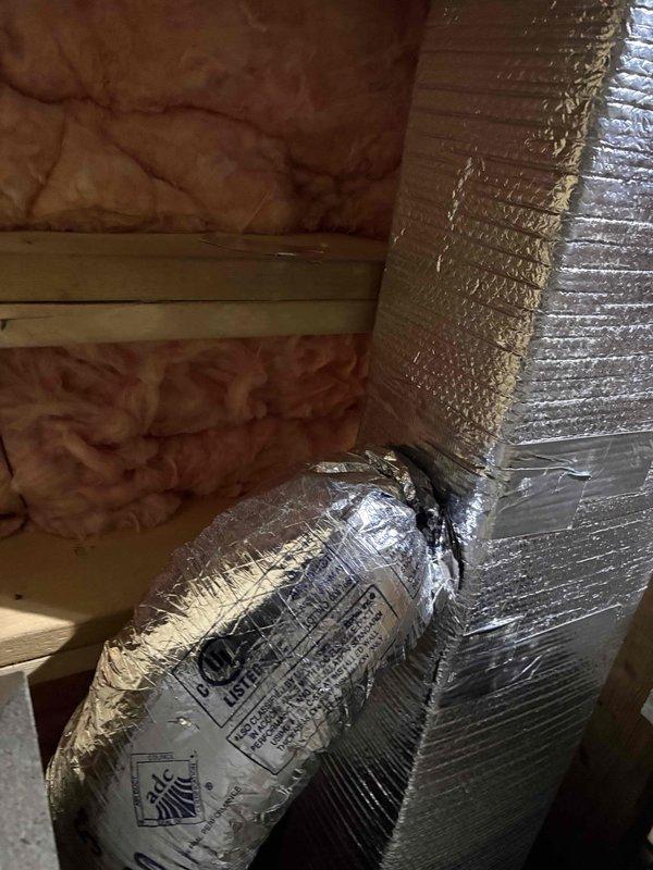 Completed full HVAC system replacement including removal and disposal of existing equipment. Installed Lennox ML14KP1-042 3.5-ton 14 SEER heat pump outdoor unit on new pressure-treated wood platform. Installed Lennox CBK45UHET-042 air handler with 15kw electric heat pack in attic space. Furnished and installed metal duct transitions to adapt new equipment to existing ductwork system. Replaced outdoor disconnect and electrical whip for code compliance. Reused existing electrical service, condensation drain lines, and power lines where applicable. Installed Honeywell TH6320WF digital WiFi thermostat for system control. Added bathroom exhaust ventilation connection to downstairs bathroom as requested, integrating vent into existing duct system. Installed fresh air filter at unit. System tested and verified operational with proper airflow, refrigerant charge, and heating/cooling cycles. One-year parts and labor warranty provided from installation date.