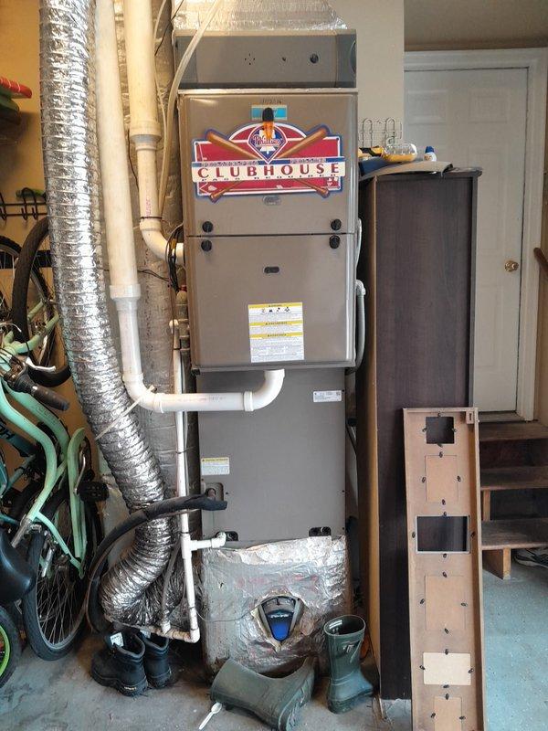 Installed owner-supplied evaporator coil to existing R410A heat pump system, utilizing the existing outdoor unit and thermostat. Completed installation in residential garage location with all components properly connected to ductwork, condensate drainage lines, and electrical systems, ensuring compatibility with existing R410A refrigerant system.