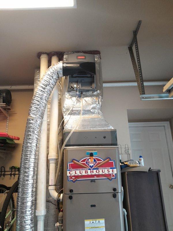 Installed owner-supplied evaporator coil to existing R410A heat pump system, utilizing the existing outdoor unit and thermostat. Completed installation in residential garage location with all components properly connected to ductwork, condensate drainage lines, and electrical systems, ensuring compatibility with existing R410A refrigerant system.