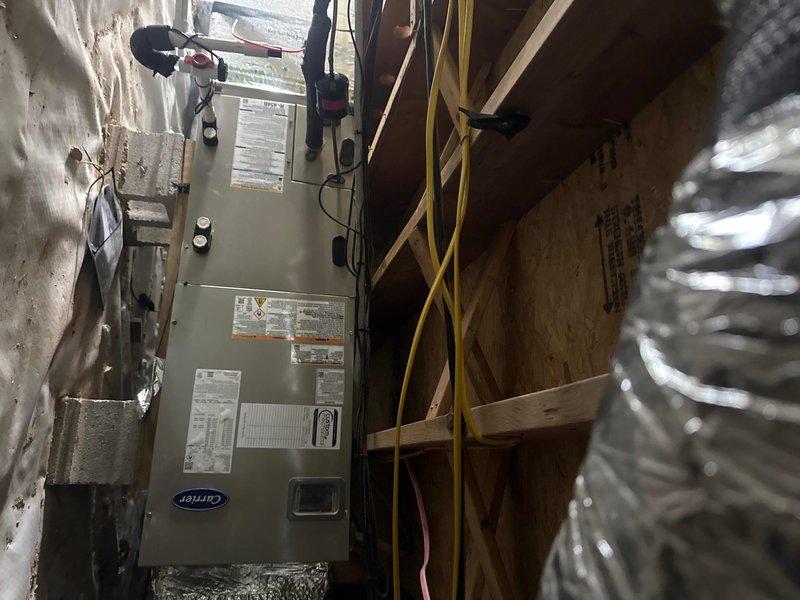 Completed full HVAC system replacement including removal and disposal of existing equipment. Installed new 3-ton 27SCA536 heat pump outdoor unit on platform with FJ5ANXB036 fan coil unit in attic space. Ran approximately 15 feet of new refrigeration lines, installed electrical whip and disconnect, and added 15KW heater with breakers to air handler. Mounted and configured S1200 WiFi thermostat for system control. Performed system startup, verified proper refrigerant pressures and temperatures using manifold gauges, and confirmed all equipment operating within manufacturer specifications. System covered under 1-year comprehensive parts and labor warranty.