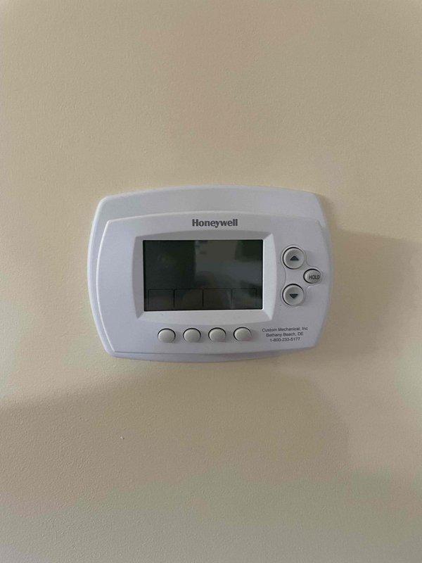 Responded to no cooling complaint on rooftop HVAC system. Upon arrival, found outdoor condenser unit low on refrigerant charge. Documented equipment condition and thermostat settings with photos for service records. Additional diagnostic time will be required to locate potential refrigerant leak, pressure test system, and determine if repair or recharge is most appropriate solution.