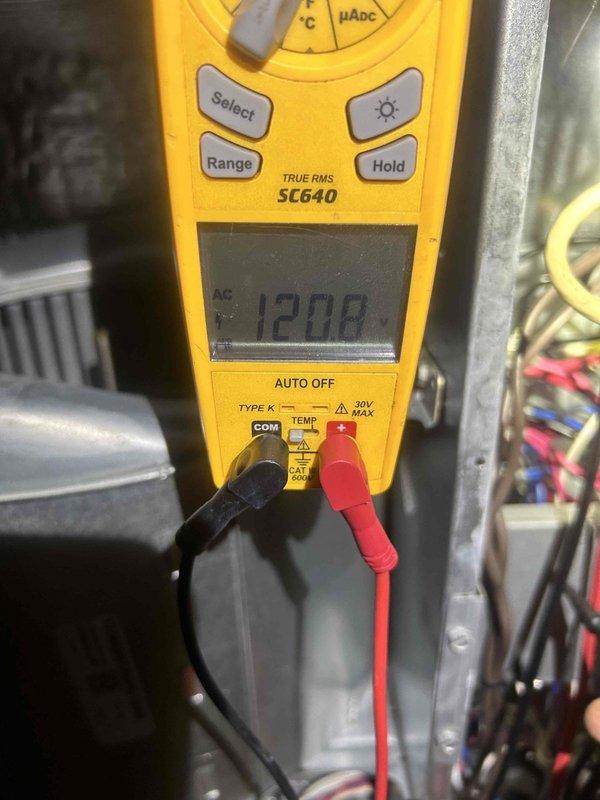 Completed scheduled cooling maintenance visit on residential HVAC system. Performed comprehensive electrical diagnostics using digital multimeter, recording voltage readings of 120.8V and 154.7V at various system components to verify proper electrical supply and operation. Inspected wiring connections, tested system performance parameters, and confirmed all cooling equipment operating within normal specifications.