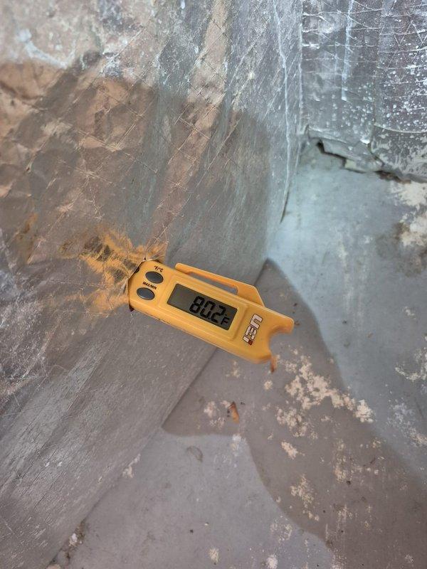 # HVAC Service Report - No Cool Complaint

Responded to no cooling complaint on residential HVAC system less than 10 years old. Upon arrival, performed temperature diagnostics on supply ductwork and refrigerant lines in crawl space using digital thermometer. Supply air temperature measured 80.2°F at register, confirming inadequate cooling performance. Inspected insulated refrigerant line set and verified proper insulation integrity on suction line. System evaluated for potential refrigerant charge issues, airflow restrictions, or compressor performance problems based on temperature differential readings.