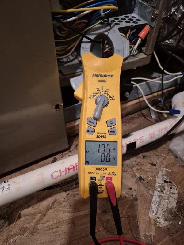 Performed routine cooling maintenance visit on residential HVAC system. Conducted electrical diagnostics using clamp meter, verifying amperage readings at outdoor unit disconnect panel showed 366 amps, and confirmed proper operation with 0.0 reading at indoor air handler. All electrical connections, wiring, and components inspected and found to be in proper working condition.