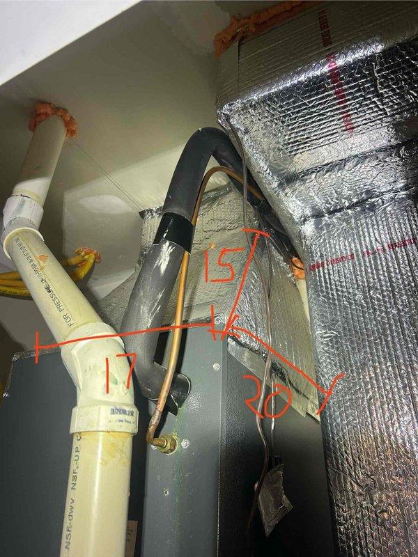 Responded to no cooling call on residential HVAC system. Upon arrival, performed diagnostic inspection of air handler unit located in attic space and verified electrical panel connections. System evaluation included temperature differential measurements across evaporator coil (readings of 15-16 degrees documented in photos) and inspection of refrigerant lines, condensate drain system, and electrical components. Identified issue preventing system operation, completed necessary repairs to restore cooling function, and verified proper system operation before departure.