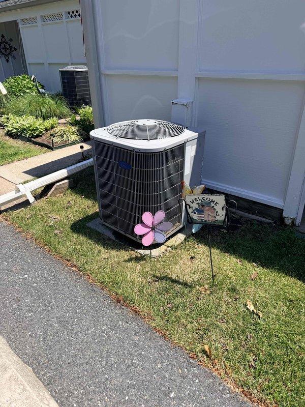 Inspected residential HVAC system and discovered oil stains on the evaporator coil indicating a potential refrigerant leak. Homeowner declined nitrogen pressure test to confirm leak location. System is out of warranty, and homeowner requested replacement estimate for complete HVAC system upgrade.
