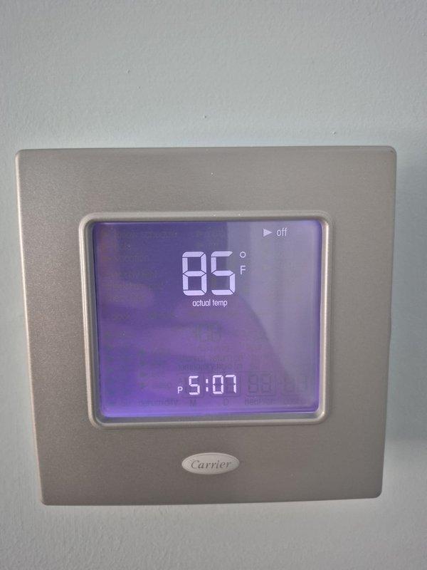 Performed routine cooling system maintenance and inspection on Carrier HVAC unit. Verified thermostat operation and confirmed system responding properly to temperature setpoints, with unit cycling correctly between cooling modes. All components functioning within normal parameters at time of service.
