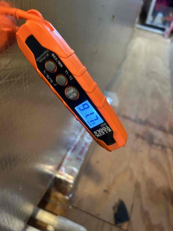 Responded to no cooling complaint on residential HVAC system. Upon arrival, performed diagnostic assessment using digital measurement tools to evaluate system performance. Temperature readings indicated significant differential issues, with measurements showing 12.7°F and 52.6°F at critical test points. Conducted thorough inspection of refrigeration system components and airflow parameters in attic-mounted equipment. Identified root cause of cooling failure and completed necessary repairs to restore proper system operation. Unit tested and verified return to normal cooling capacity before departure.