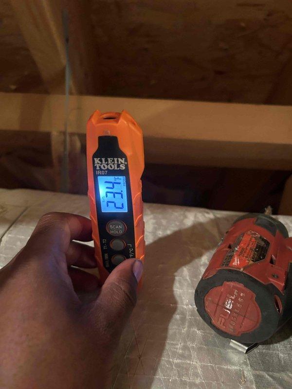 Responded to no cooling complaint on residential HVAC system. Upon arrival, performed diagnostic assessment using digital measurement tools to evaluate system performance. Temperature readings indicated significant differential issues, with measurements showing 12.7°F and 52.6°F at critical test points. Conducted thorough inspection of refrigeration system components and airflow parameters in attic-mounted equipment. Identified root cause of cooling failure and completed necessary repairs to restore proper system operation. Unit tested and verified return to normal cooling capacity before departure.
