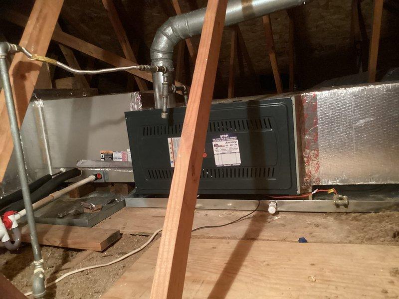 Conducted comprehensive load calculation assessment for residential property experiencing heating and cooling inadequacies following previous furnace replacement. Evaluated existing dual HVAC unit configuration installed in attic space, documented current equipment specifications, and analyzed system capacity relative to home's thermal requirements. Provided equipment sizing recommendations to ensure proper heating and cooling performance for the residence.