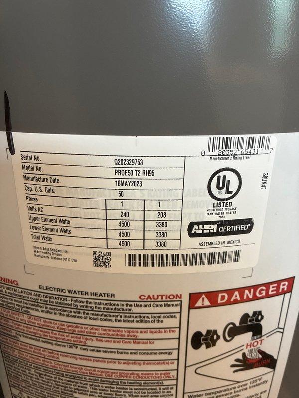 Performed inspection of residential water heating system in response to tankless water heater service request. Upon arrival, determined property is equipped with a conventional 50-gallon electric tank water heater (Model PRO E50 T2 RH95, manufactured May 2023) rather than a tankless unit. Documented existing equipment specifications and current condition. Observed significant mineral deposits and discoloration in bathroom fixtures, indicating potential hard water issues that may affect water heater longevity and performance.