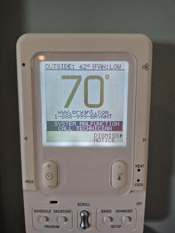 Responded to no cooling call on Bryant FE4ANB006 air handler system. Upon arrival, thermostat displayed "SYSTEM MALFUNCTION CALL TECHNICIAN" error message. System was turned off per customer request. Documented unit nameplate information showing 208/230V, 1-phase, R-410A refrigerant system. Customer advised of diagnostic fee and declined service at this time.