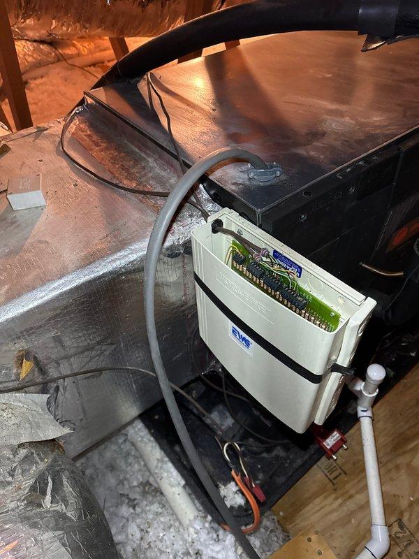 Performed comprehensive inspection and tune-up on two HVAC systems located in attic space. Evaluated air handler components, control boards, electrical connections, and ductwork integrity. All systems tested and found operating within normal parameters, with proper airflow through flexible duct runs and adequate insulation coverage maintained throughout installation area.