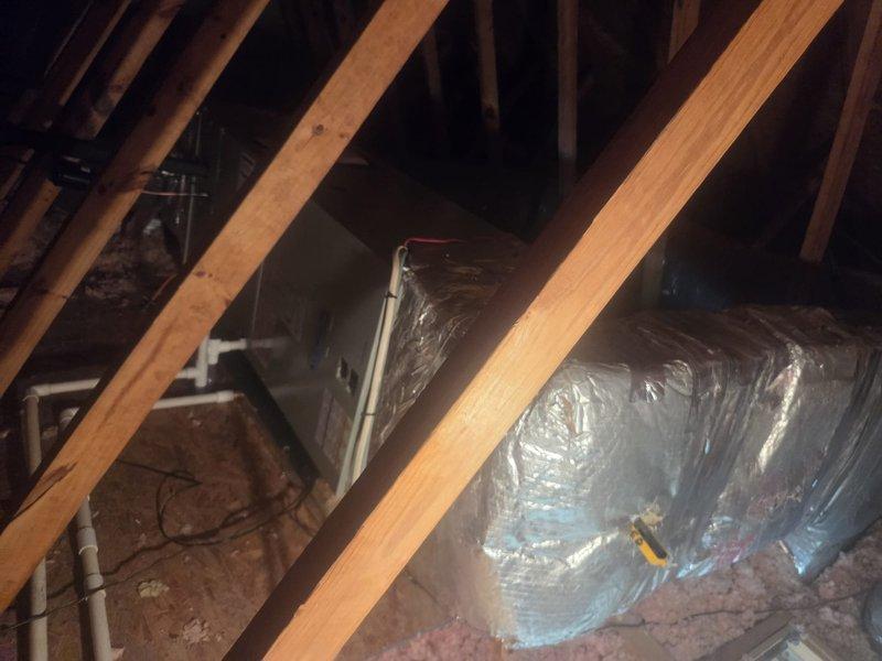 Completed full HVAC system replacement including removal and disposal of existing equipment. Installed 3.5 ton 14.3 SEER heat pump outdoor unit on existing stand with new whip and disconnect. Installed variable speed fan coil unit in attic with drain pan and shut-off valve. Added 15KW electric heat strip with dedicated breaker for supplemental heating. Flushed, pressure tested, and recharged refrigeration lines to manufacturer specifications. Installed 1-inch filter rack and S1200 non-programmable thermostat for system control. System tested and verified operational. Extended maintenance agreement coverage for one year on single-system residence.