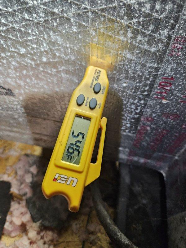 Responded to no cooling complaint on upstairs system covered under blanket membership. Upon inspection, discovered evaporator coil completely frozen with heavy ice accumulation throughout. Measured supply air temperature at 57.5°F at coil and return air at 76.1°F, confirming restricted airflow condition. Diagnosed frozen coil caused by insufficient airflow across evaporator. Shut down system to allow complete ice melt before further diagnostics. Will need to return to verify airflow, check refrigerant charge, inspect blower operation, and confirm filter condition once coil has fully thawed.