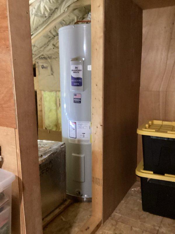 Successfully replaced a 50-gallon tall water heater in an attic location requiring a two-person crew due to access constraints and unit dimensions. Removed the existing water heater and installed a new 50-gallon tall unit measuring 58"H x 20"W, which fit perfectly within the available space between framing members.

Installation included a complete drain pan for leak protection, new expansion tank for thermal expansion control, and all necessary brass fittings including 3/4" tee, 3/4" 90-degree elbow, 3/4" x 4" and 3/4" x 6" nipples, three 3/4" high-temperature male adapters, and two 18" flexible water connectors for secure supply line connections. All plumbing connections were properly fitted with brass components to ensure durability and code compliance.

The installation was completed over four hours with proper staging of materials and equipment. All connections were tested for leaks, and the unit was verified operational upon completion.