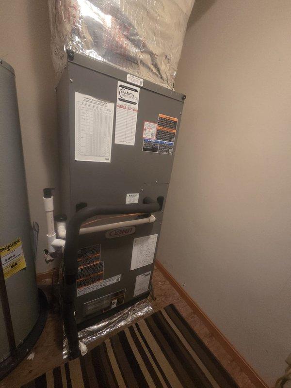 Completed full HVAC system replacement including removal and disposal of existing equipment. Installed new Lennox ML14KP1-036 3-ton 14 SEER heat pump outdoor unit on pressure-treated wood platform with new outdoor disconnect and electrical whip. Installed Lennox CBK45UHET-036 air handler in interior utility closet with Lennox 10 kW electric heat pack. Fabricated and installed metal duct transitions to adapt new equipment to existing ductwork. Reused existing electrical connections, condensate drain lines, and power supply lines where applicable. Installed Honeywell digital WiFi thermostat for system control. Verified all connections, tested system operation, and confirmed proper heating and cooling functionality. System commissioned and operational with filter installed at unit. One-year maintenance contract initiated from current expiration date.