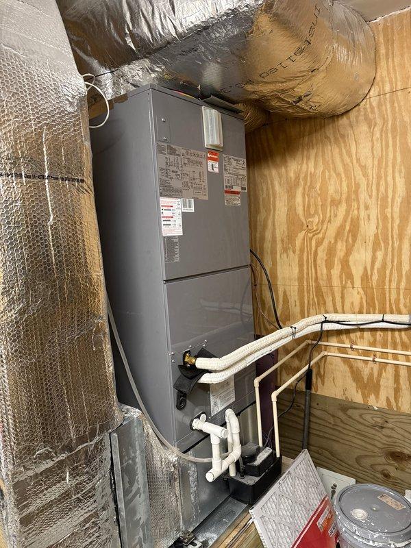 Responded to no cooling complaint on second floor. Upon inspection, found Carrier 40MBABQ36 fan coil unit installed in attic space. Diagnosed system malfunction, restored cooling operation to second floor zone, and verified proper airflow through supply ductwork.