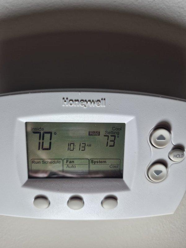 Completed scheduled cooling maintenance visit on HVAC system. Verified Honeywell programmable thermostat operation, confirming proper temperature control, display functionality, and system cycling between cooling modes. Unit operating within normal parameters with thermostat maintaining setpoint temperatures and responding appropriately to user inputs.